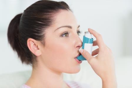 Woman close up inhaler web